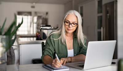 Older employee at her computer