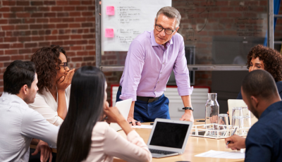 Male leading a meeting